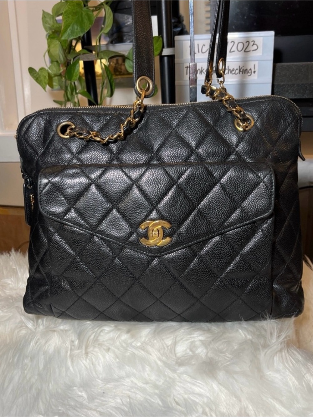 CHANEL Black Quilted Shoulder Bag with Gold Accents
